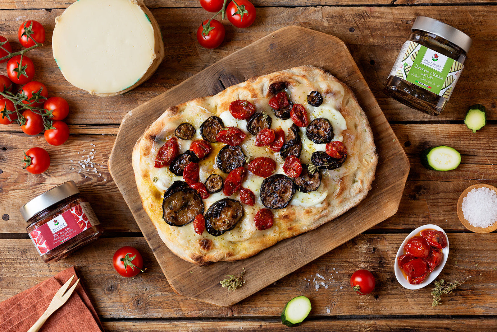 PIZZA ALLA PALA with grilled zucchini, mild provolone, and semi-dry cherry tomatoes