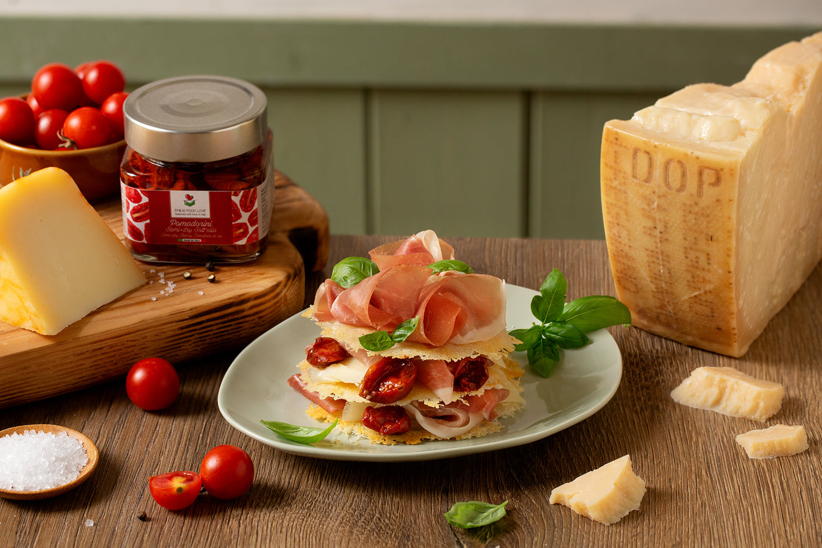 PARMIGIANO REGGIANO MILLE-FEUILLE with Prosciutto di Siena, Semi-dry Cherry Tomatoes and Caciotta cheese